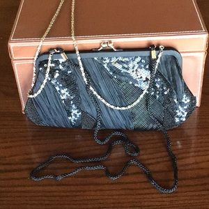 Black Sequin and Satin Clutch with sliver chain and black satin rope.